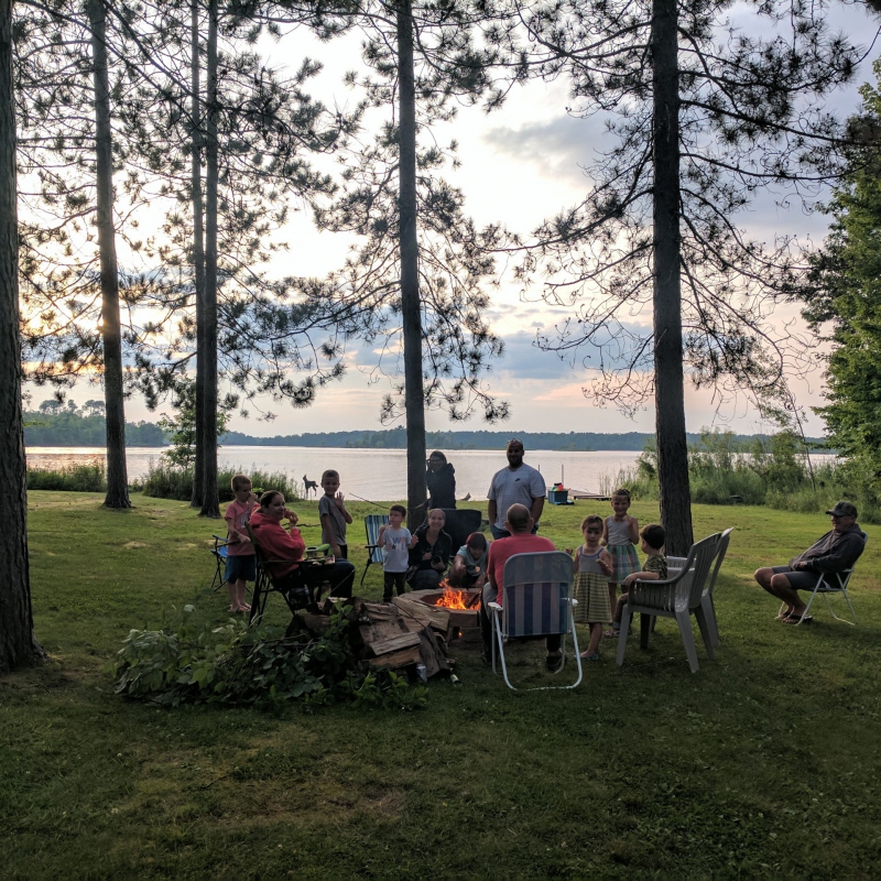 Group around Cabin 1 bonfire pit